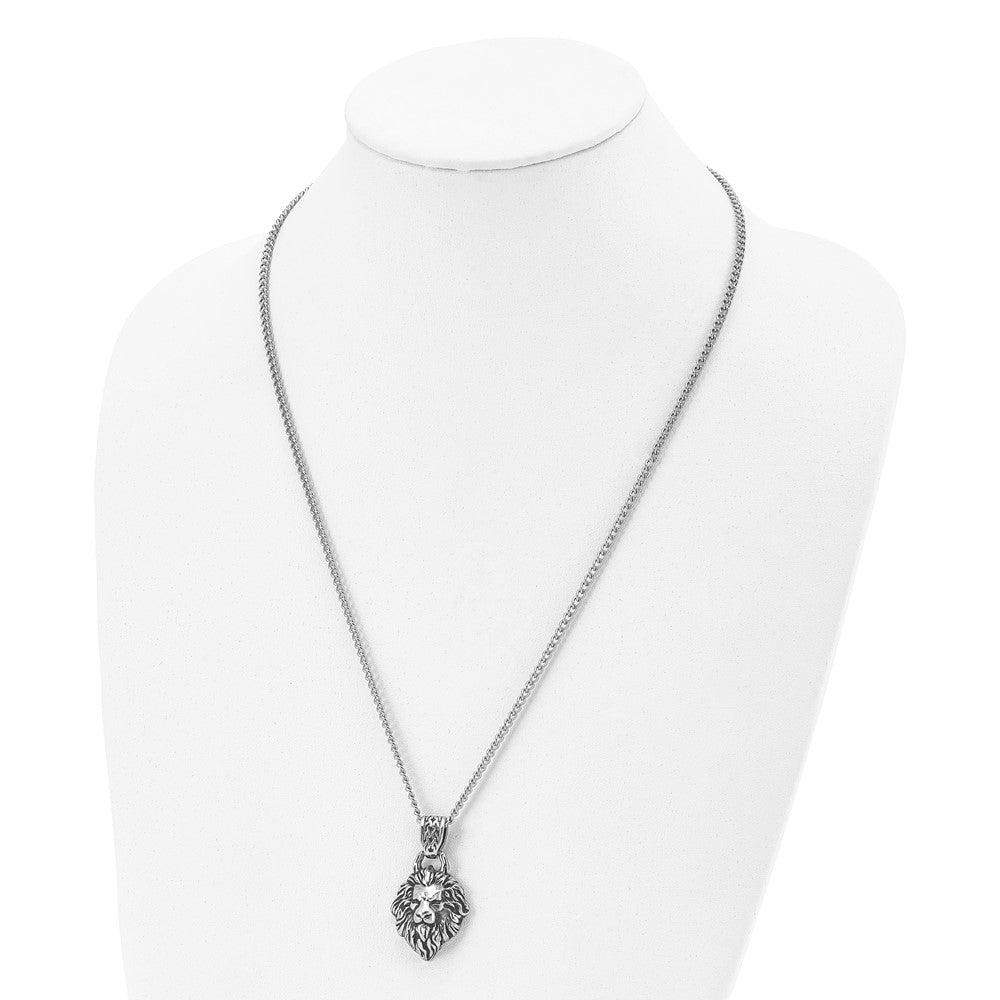 Chisel Stainless Steel Antiqued and Polished Small Lion Head with Swirl Design Pendant on a 24 inch Curb Chain Necklace