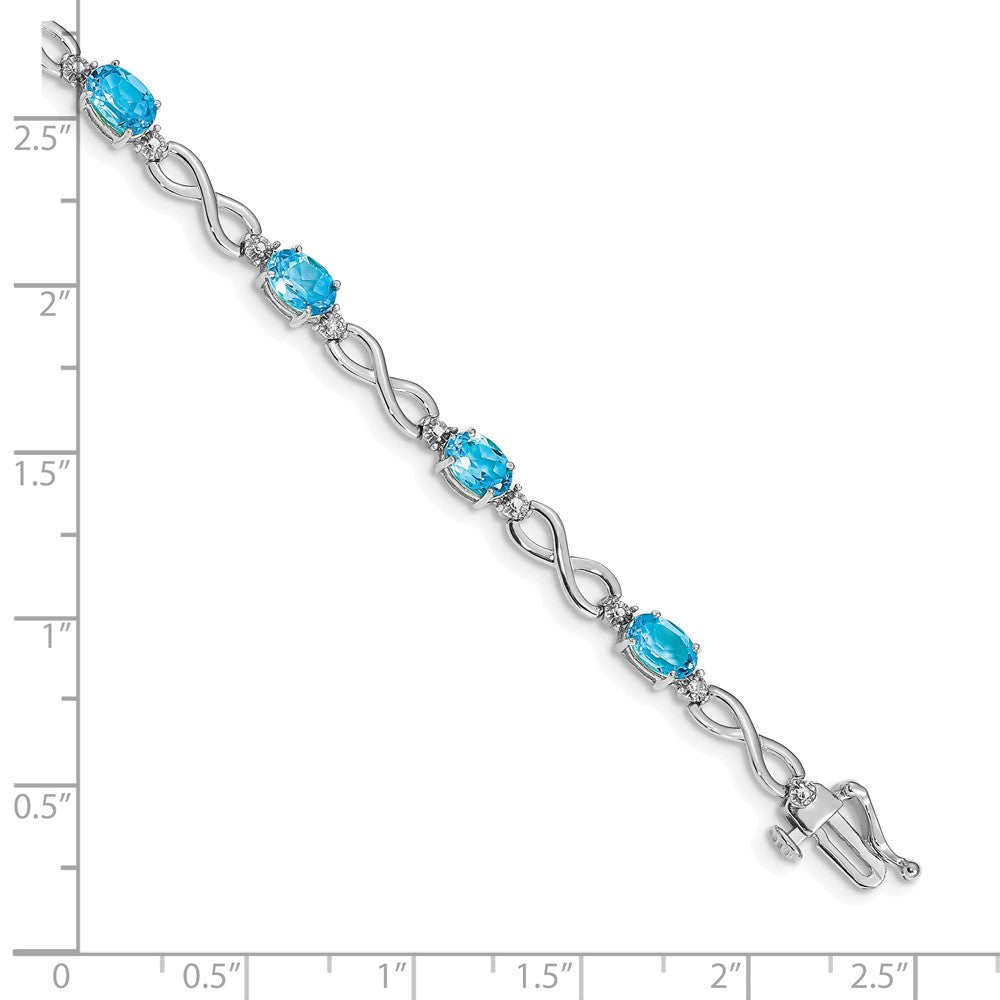 14k White Gold Blue Topaz and Diamond Infinity Bracelet