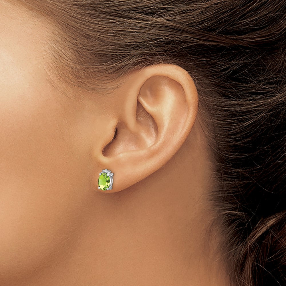 Sterling Silver Rhodium Plated Oval Peridot and Diamond Post Earrings
