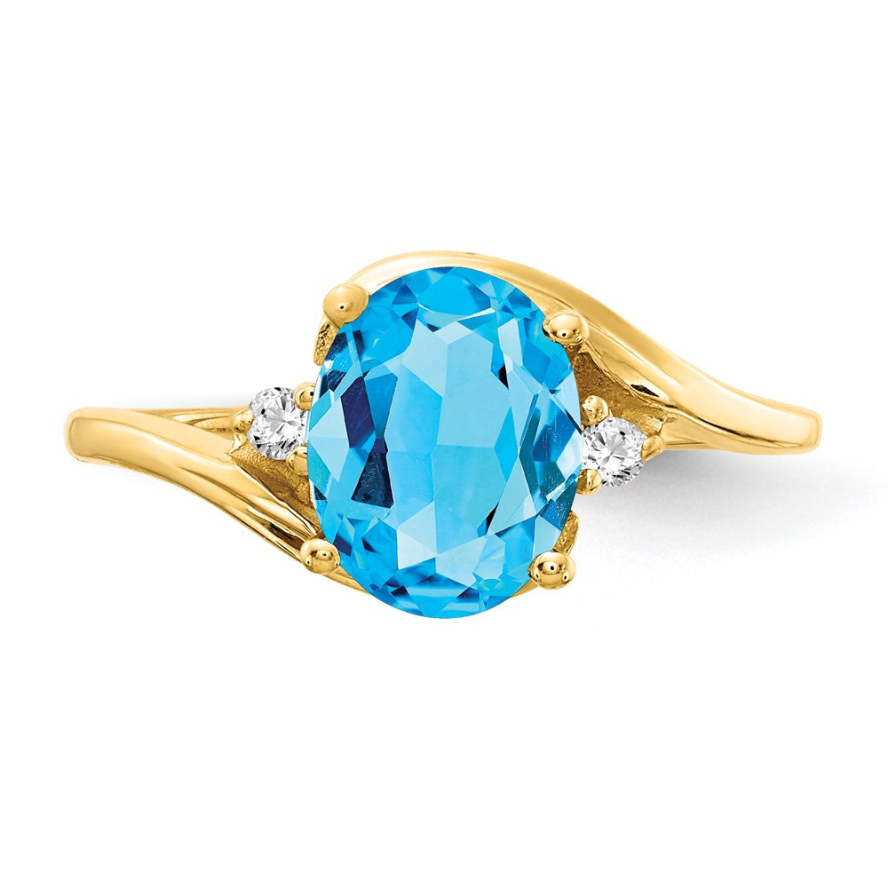 14k 8x6mm Oval Blue Topaz VS Diamond ring