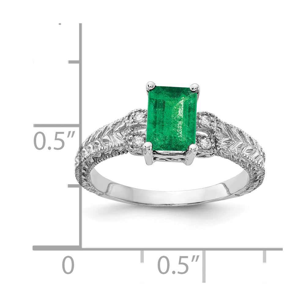 14k White Gold 7x5mm Emerald Cut Emerald VS Diamond ring
