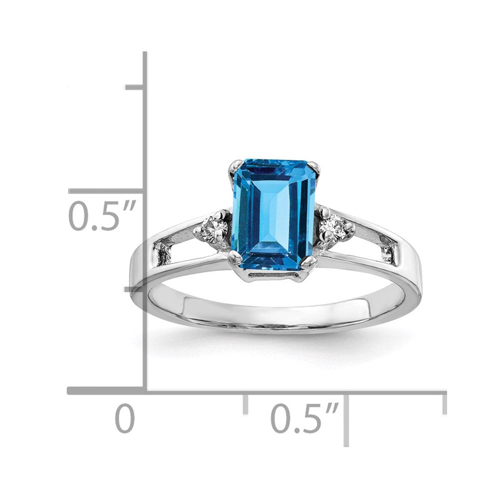 14k White Gold 7x5mm Emerald Cut Blue Topaz A Diamond ring